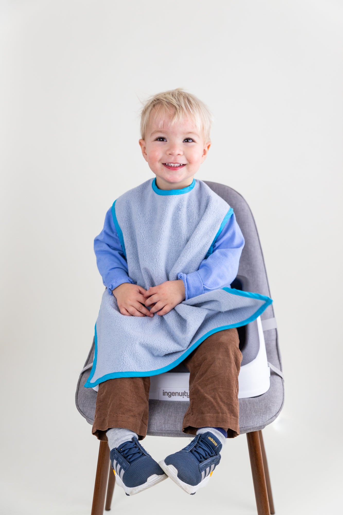 Car Seat Bib combines ultra absorbent fabric and waterproof backing to protect babies, toddlers, kids from motion sickness and spills in the car, stroller, and meals.